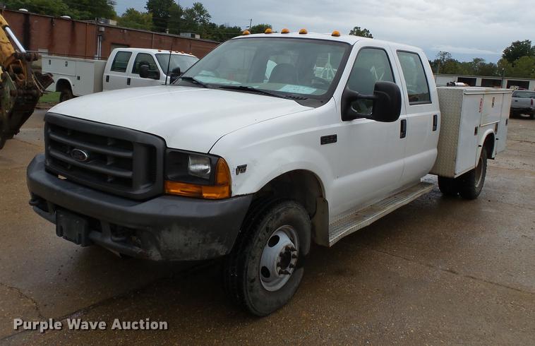 image for item DB7024 2000 Ford F350 Super Duty Crew Cab utility bed pickup truck