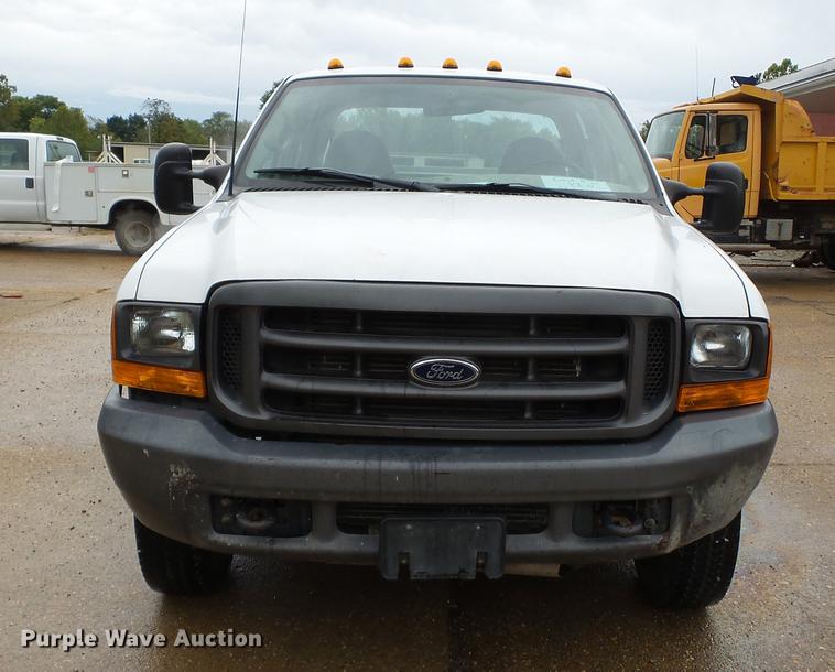 image for item DB7024 2000 Ford F350 Super Duty Crew Cab utility bed pickup truck