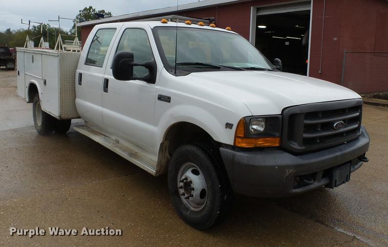 image for item DB7024 2000 Ford F350 Super Duty Crew Cab utility bed pickup truck