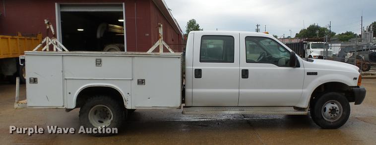 image for item DB7024 2000 Ford F350 Super Duty Crew Cab utility bed pickup truck