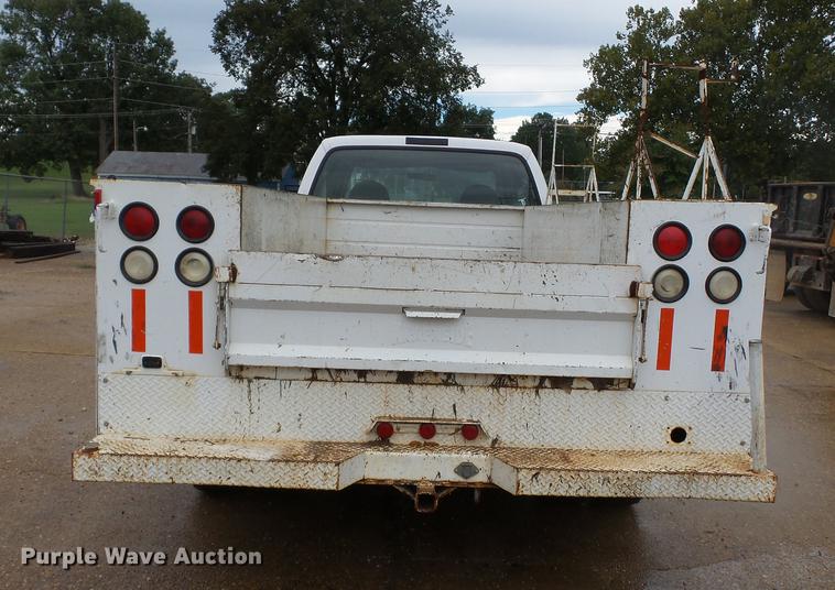 image for item DB7024 2000 Ford F350 Super Duty Crew Cab utility bed pickup truck