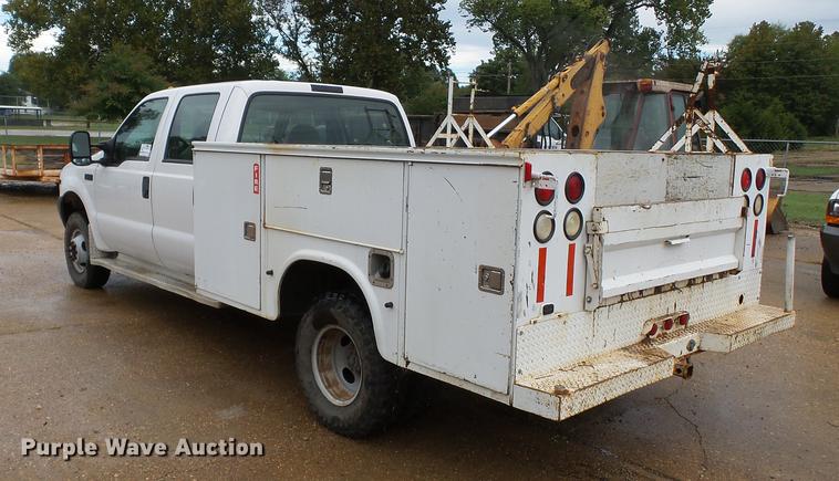 image for item DB7024 2000 Ford F350 Super Duty Crew Cab utility bed pickup truck