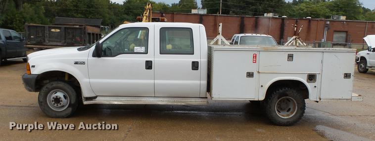 image for item DB7024 2000 Ford F350 Super Duty Crew Cab utility bed pickup truck