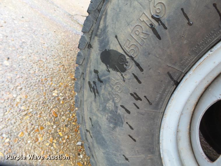 image for item DB7024 2000 Ford F350 Super Duty Crew Cab utility bed pickup truck