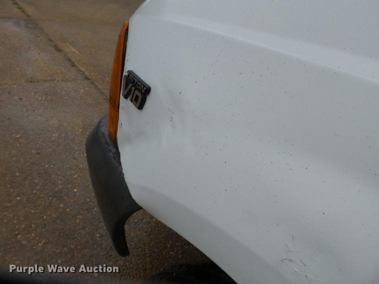 image for item DB7024 2000 Ford F350 Super Duty Crew Cab utility bed pickup truck