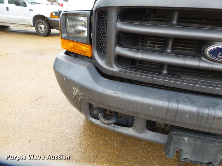 image for item DB7024 2000 Ford F350 Super Duty Crew Cab utility bed pickup truck