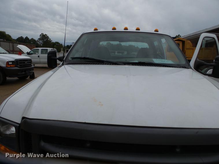 image for item DB7024 2000 Ford F350 Super Duty Crew Cab utility bed pickup truck