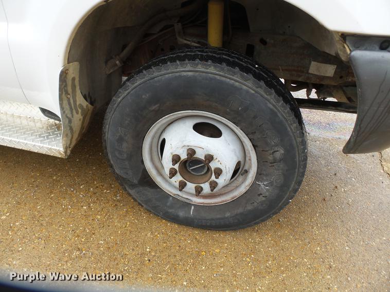 image for item DB7024 2000 Ford F350 Super Duty Crew Cab utility bed pickup truck