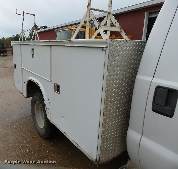 image for item DB7024 2000 Ford F350 Super Duty Crew Cab utility bed pickup truck