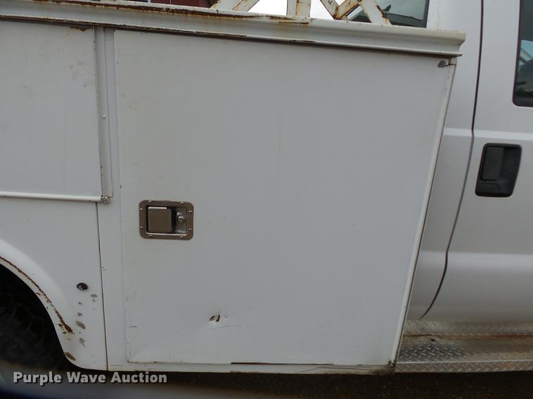 image for item DB7024 2000 Ford F350 Super Duty Crew Cab utility bed pickup truck