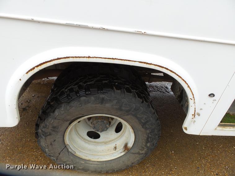 image for item DB7024 2000 Ford F350 Super Duty Crew Cab utility bed pickup truck