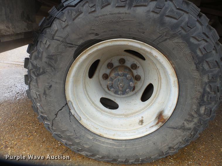 image for item DB7024 2000 Ford F350 Super Duty Crew Cab utility bed pickup truck