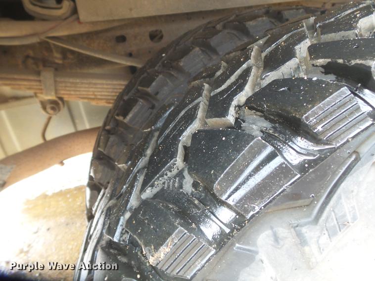 image for item DB7024 2000 Ford F350 Super Duty Crew Cab utility bed pickup truck