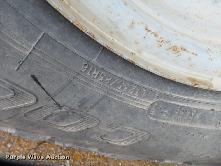 image for item DB7024 2000 Ford F350 Super Duty Crew Cab utility bed pickup truck