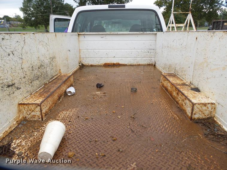 image for item DB7024 2000 Ford F350 Super Duty Crew Cab utility bed pickup truck