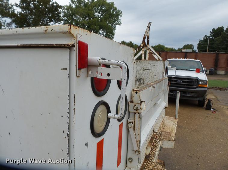 image for item DB7024 2000 Ford F350 Super Duty Crew Cab utility bed pickup truck