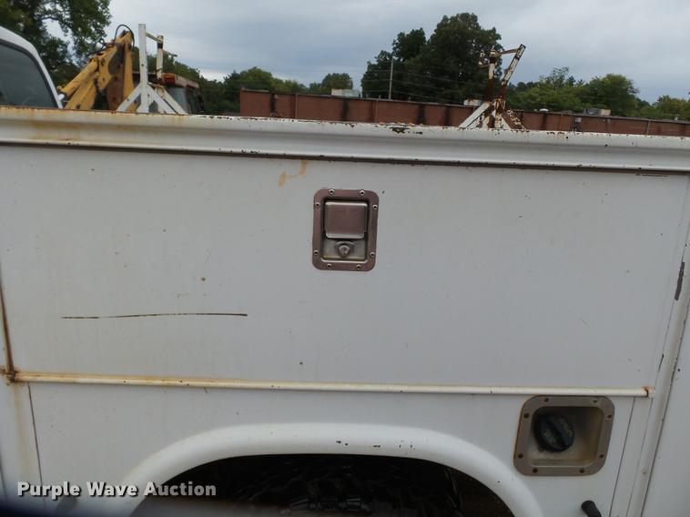 image for item DB7024 2000 Ford F350 Super Duty Crew Cab utility bed pickup truck