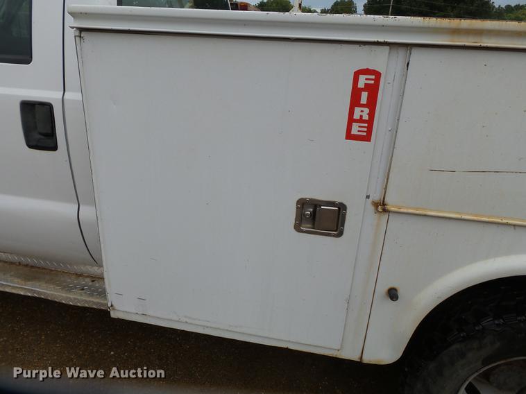 image for item DB7024 2000 Ford F350 Super Duty Crew Cab utility bed pickup truck