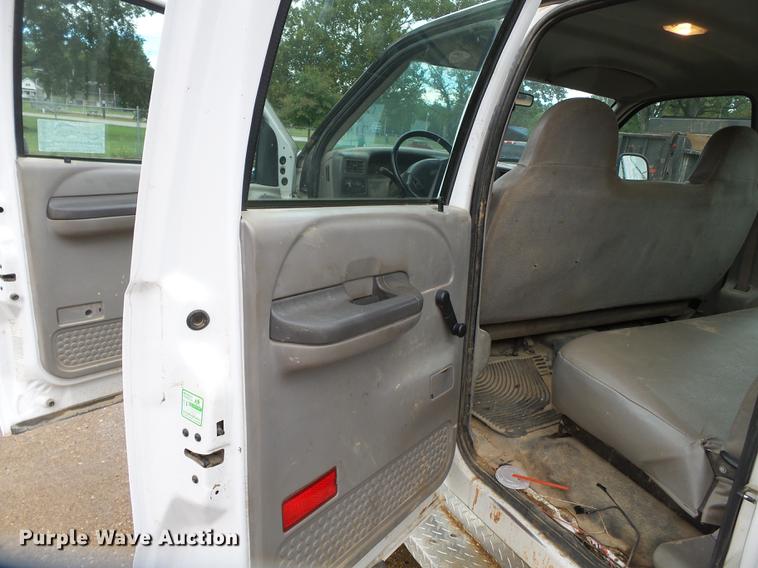 image for item DB7024 2000 Ford F350 Super Duty Crew Cab utility bed pickup truck