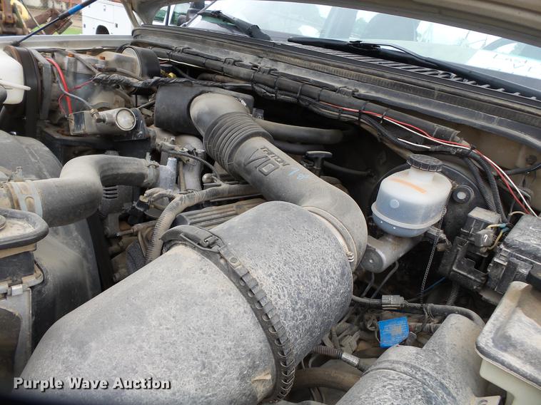 image for item DB7024 2000 Ford F350 Super Duty Crew Cab utility bed pickup truck