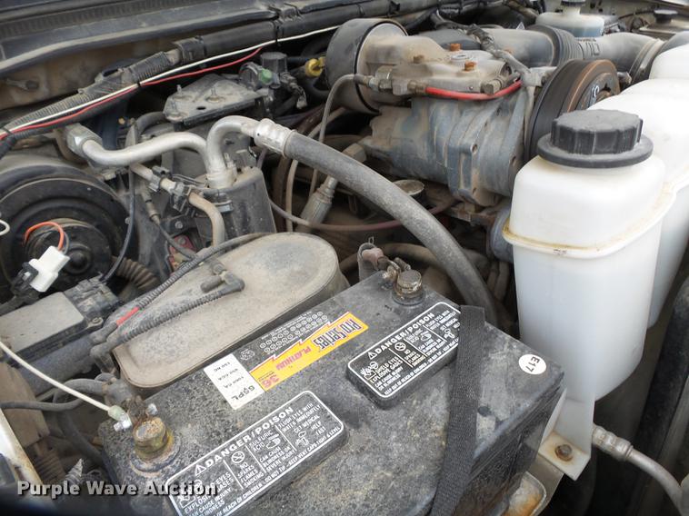 image for item DB7024 2000 Ford F350 Super Duty Crew Cab utility bed pickup truck