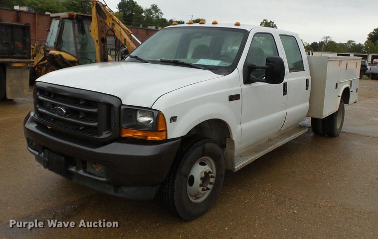 image for item DB7025 2001 Ford F350 Super Duty Crew Cab utility bed pickup truck