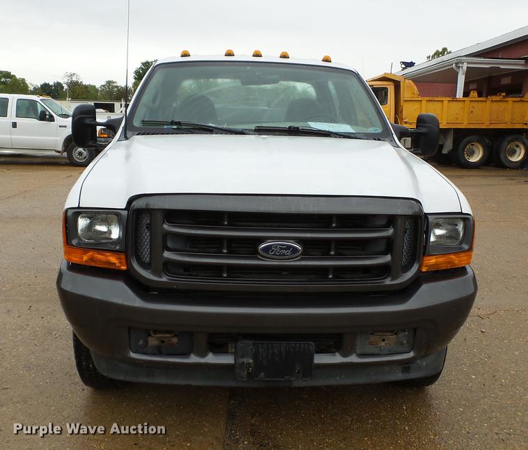 image for item DB7025 2001 Ford F350 Super Duty Crew Cab utility bed pickup truck