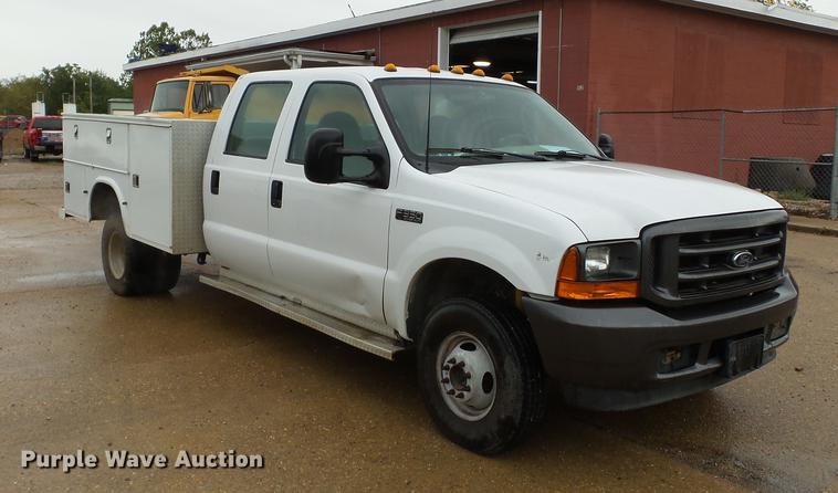image for item DB7025 2001 Ford F350 Super Duty Crew Cab utility bed pickup truck