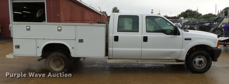 image for item DB7025 2001 Ford F350 Super Duty Crew Cab utility bed pickup truck