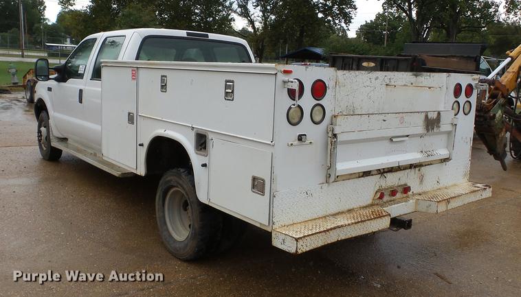 image for item DB7025 2001 Ford F350 Super Duty Crew Cab utility bed pickup truck