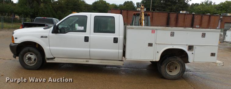 image for item DB7025 2001 Ford F350 Super Duty Crew Cab utility bed pickup truck