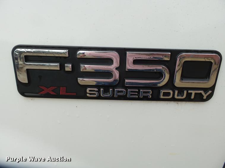 image for item DB7025 2001 Ford F350 Super Duty Crew Cab utility bed pickup truck