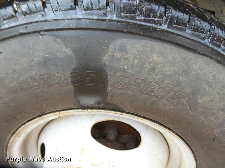 image for item DB7025 2001 Ford F350 Super Duty Crew Cab utility bed pickup truck