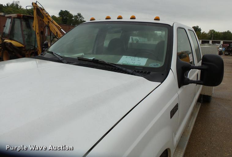 image for item DB7025 2001 Ford F350 Super Duty Crew Cab utility bed pickup truck