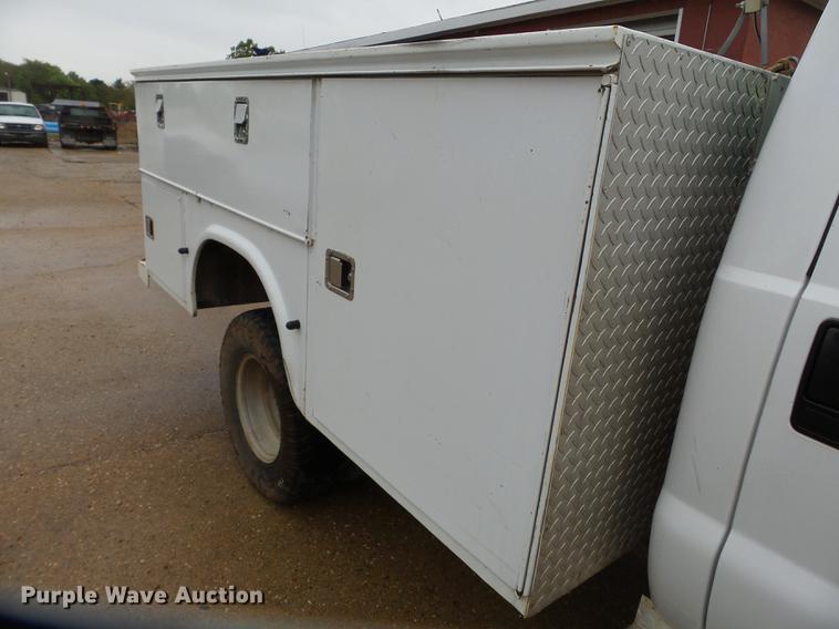 image for item DB7025 2001 Ford F350 Super Duty Crew Cab utility bed pickup truck