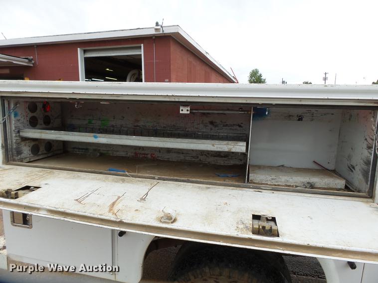 image for item DB7025 2001 Ford F350 Super Duty Crew Cab utility bed pickup truck