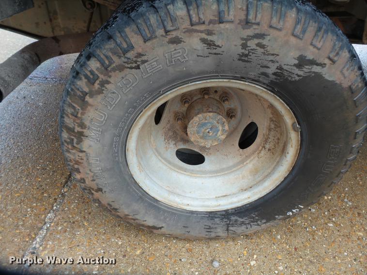 image for item DB7025 2001 Ford F350 Super Duty Crew Cab utility bed pickup truck