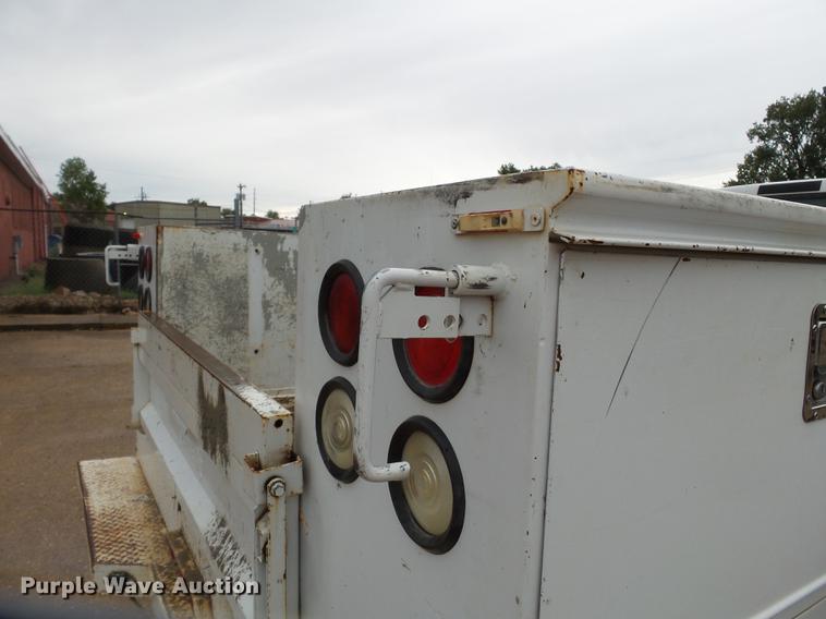 image for item DB7025 2001 Ford F350 Super Duty Crew Cab utility bed pickup truck