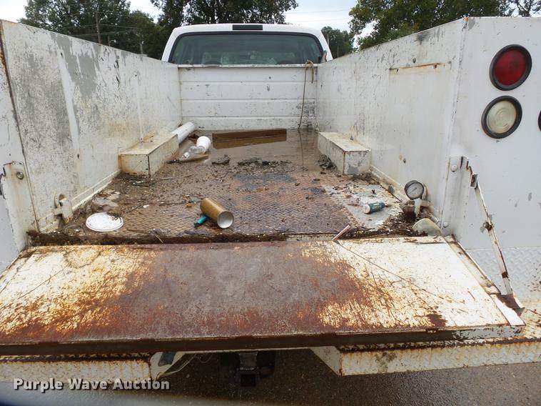 image for item DB7025 2001 Ford F350 Super Duty Crew Cab utility bed pickup truck