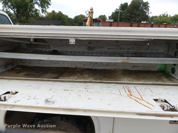 image for item DB7025 2001 Ford F350 Super Duty Crew Cab utility bed pickup truck