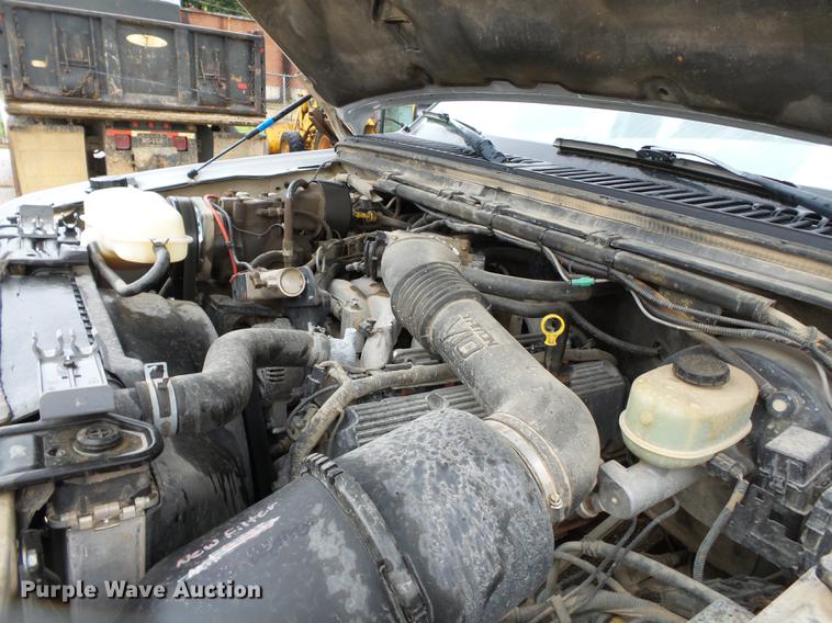 image for item DB7025 2001 Ford F350 Super Duty Crew Cab utility bed pickup truck