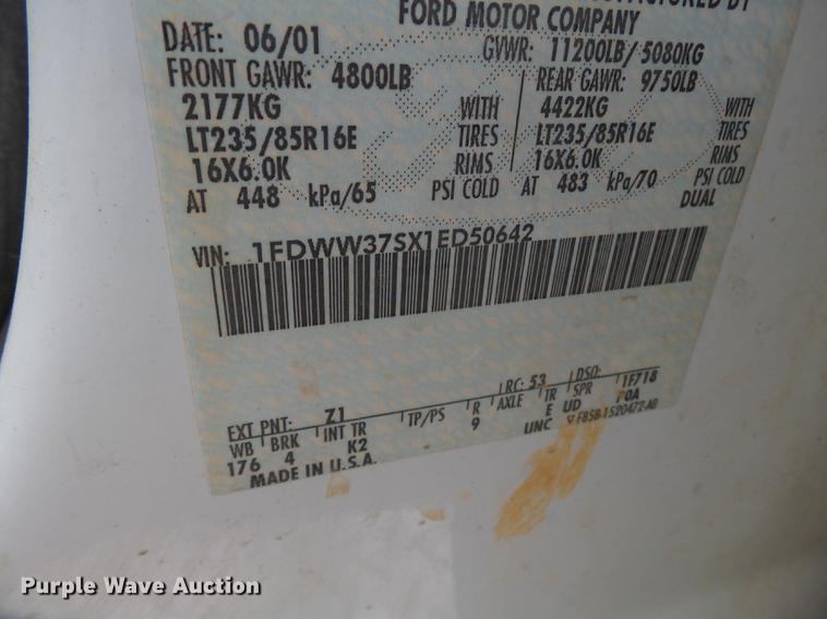 image for item DB7025 2001 Ford F350 Super Duty Crew Cab utility bed pickup truck