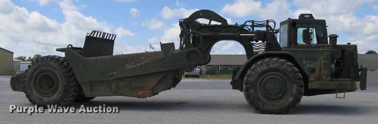 image for item DB8981 1985 Caterpillar 621B MIL conventional scraper