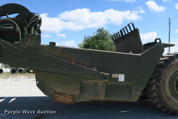 image for item DB8981 1985 Caterpillar 621B MIL conventional scraper