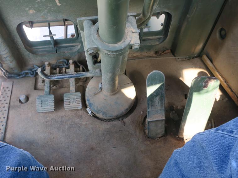 image for item DB8981 1985 Caterpillar 621B MIL conventional scraper