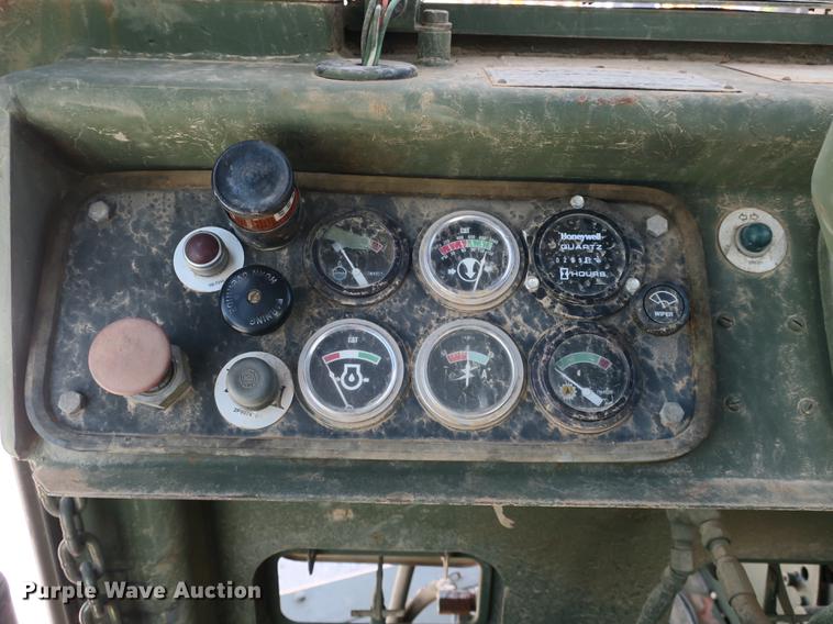 image for item DB8981 1985 Caterpillar 621B MIL conventional scraper