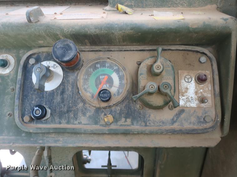 image for item DB8981 1985 Caterpillar 621B MIL conventional scraper