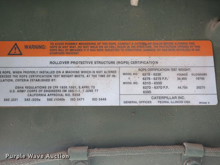 image for item DB8981 1985 Caterpillar 621B MIL conventional scraper