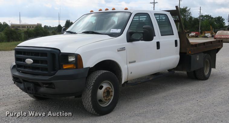 image for item DB8988 2006 Ford F350 Super Duty Crew Cab flatbed pickup truck