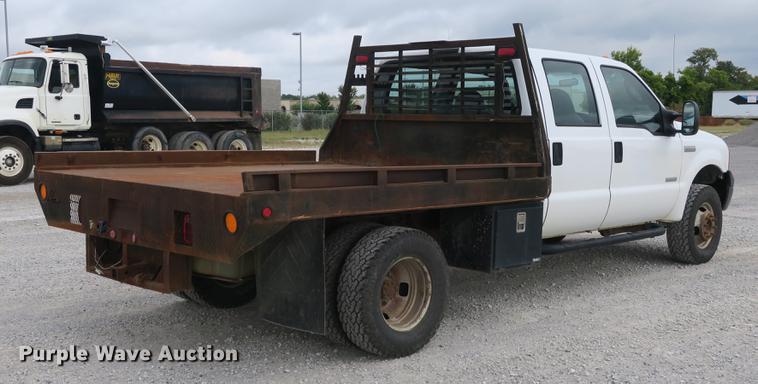 image for item DB8988 2006 Ford F350 Super Duty Crew Cab flatbed pickup truck